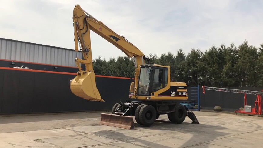 Аренда колесного экскаватора Caterpillar M315