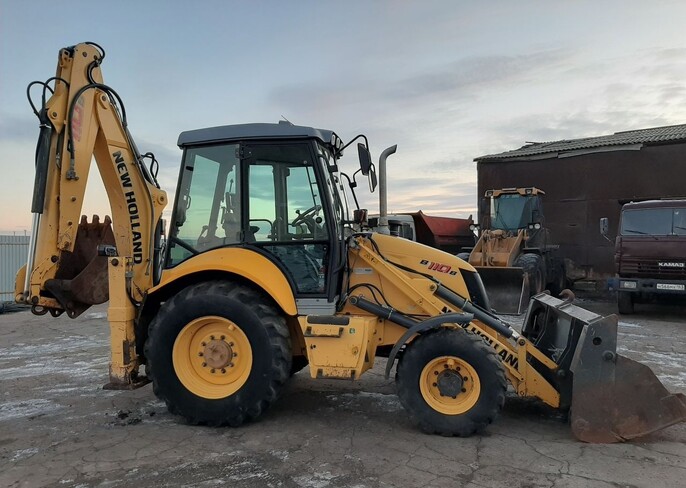 Аренда экскаватора-погрузчика New Holland B110B